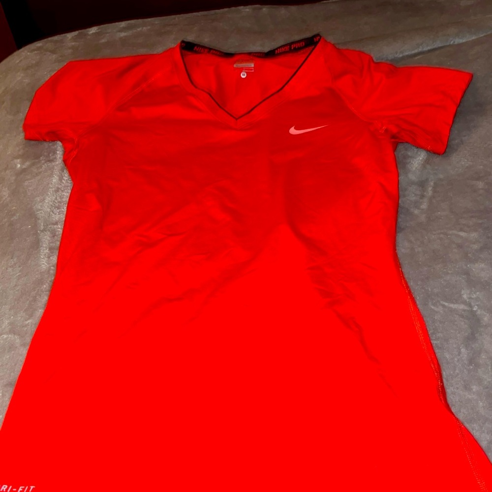 Nike Pro red v-neck short sleeve shirt